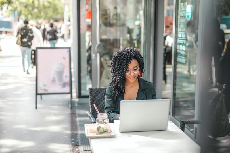 Person working on blogger outreach on a laptop